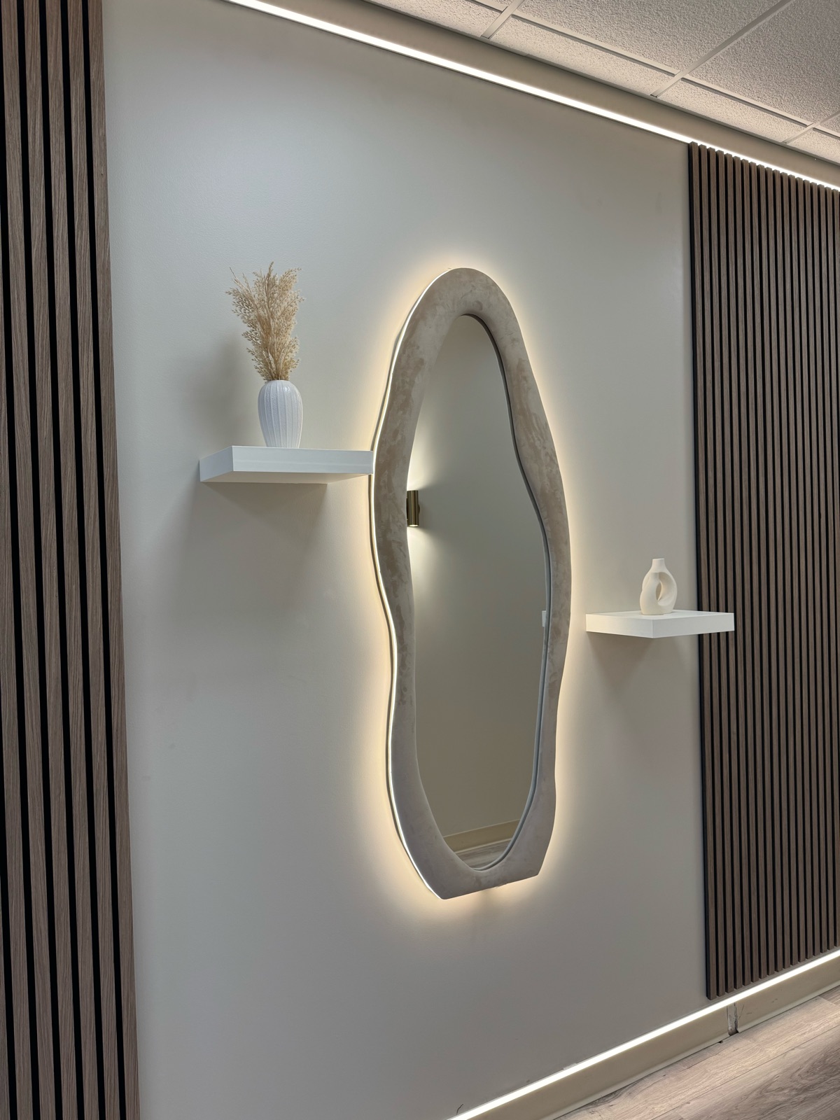 Clean, professional medical spa treatment room with neutral tones at ÉLAN STUDIO Laser Hair Removal in Highland Park