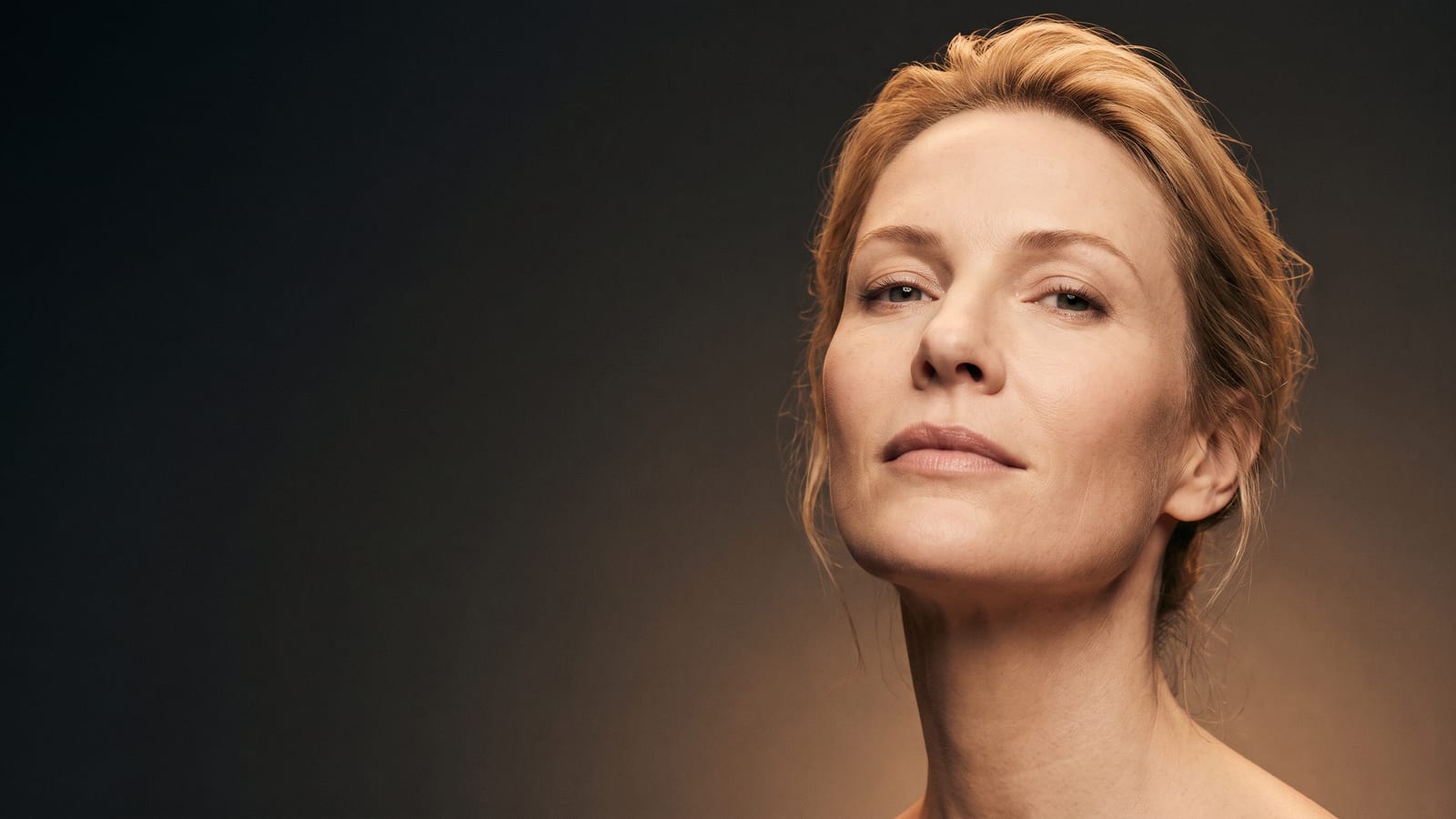 Woman with a smooth, refreshed forehead after Botox at a Highland Park med spa
