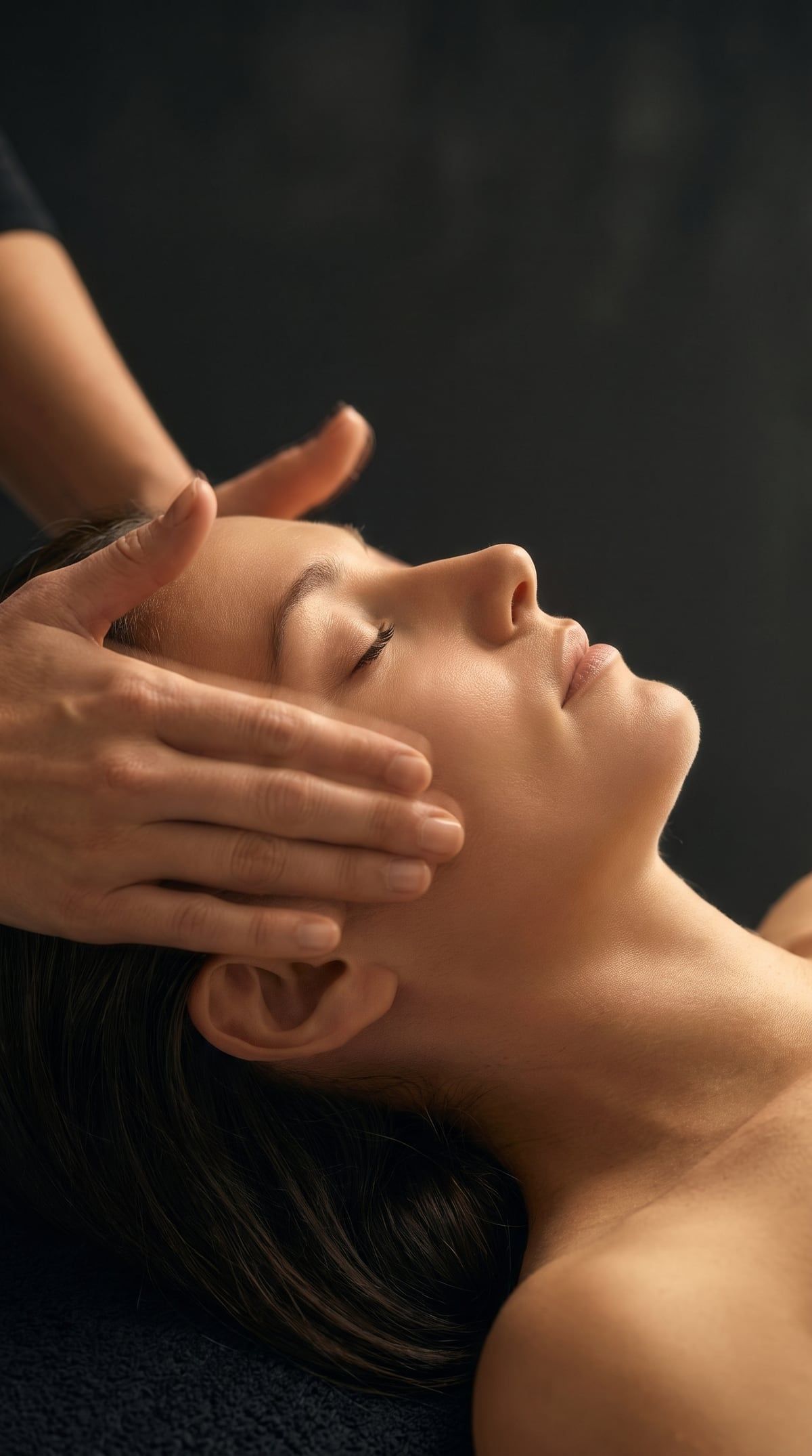 Hands-on work across the cheeks and jaw during the Classic Facial at DK Aesthetics Highland Park IL