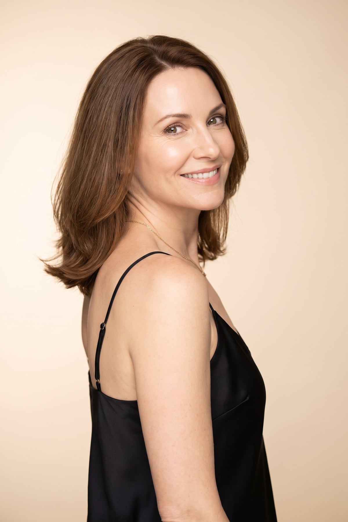 Woman with a natural, rested smile — conservative Botox at DK Aesthetics in Highland Park, IL