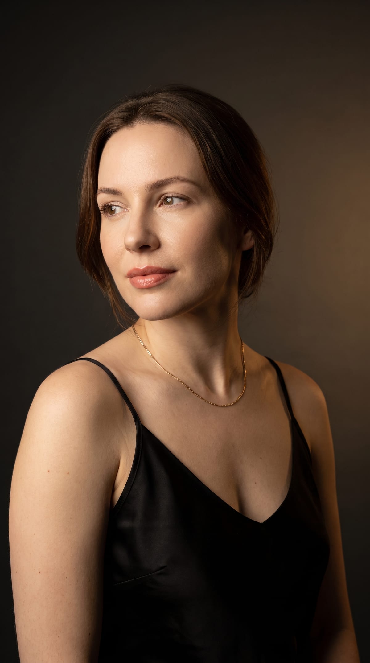 Woman with a soft, natural lip blush tint at DK Aesthetics in Highland Park, IL