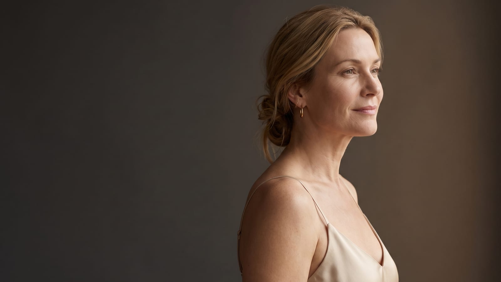 Woman with a firm, defined jawline and smooth shoulders — radiofrequency skin tightening at DK Aesthetics in Highland Park, IL